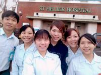 Ms WU Yu Ying (second from left) and other CUHK Nursing students in front of St Helier Hospital on the last day of their clinical placement